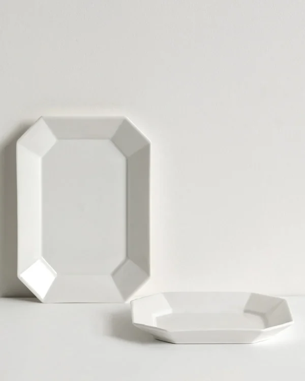 Artist-Collaboration White Porcelain Octagonal Plates in ivory — in a room setting