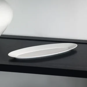 Artist Collaboration White Porcelain Leaf Boat Plate in ivory — front view