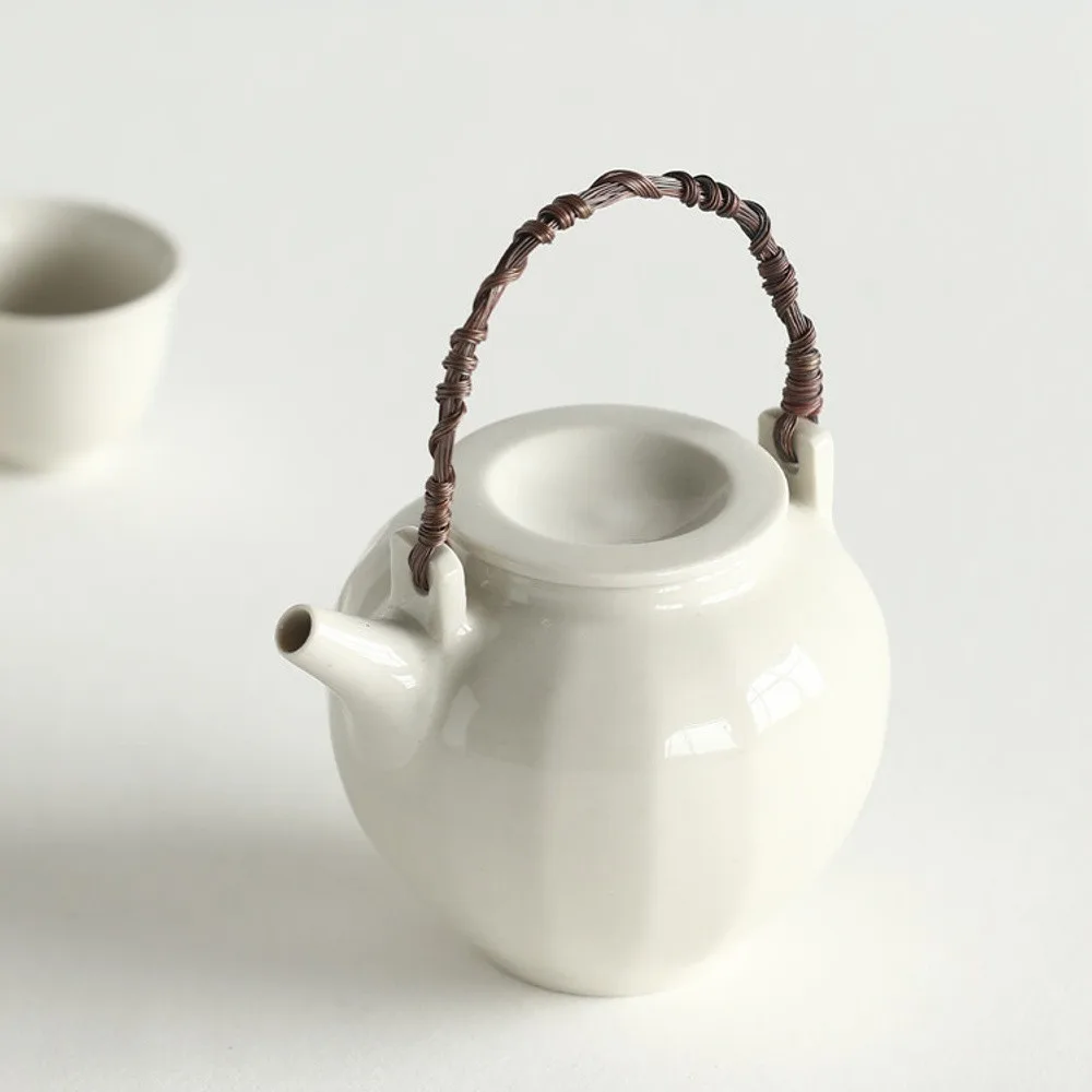 Artist Collaboration White Porcelain Loop-Handle Teapot and in ivory — front view