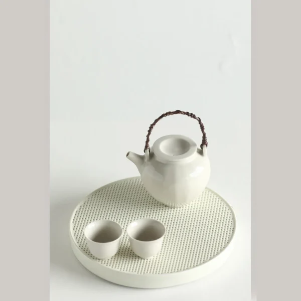 Artist Collaboration White Porcelain Loop-Handle Teapot and in ivory — in a room setting