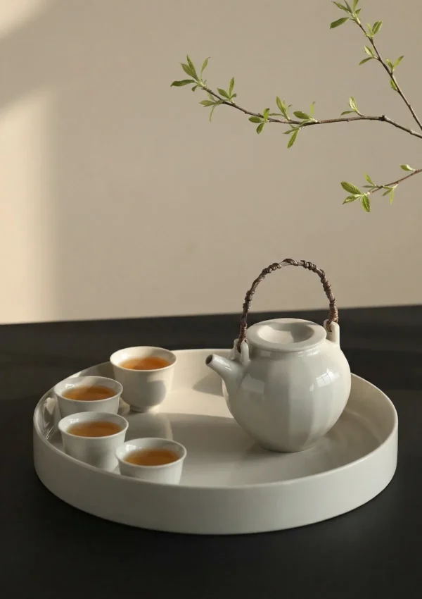 Artist Collaboration White Porcelain Loop-Handle Teapot and in ivory — in a room setting