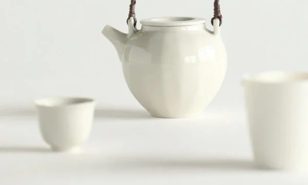 Artist Collaboration White Porcelain Loop-Handle Teapot and in ivory — in a room setting