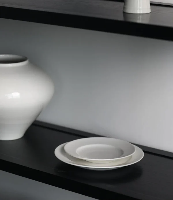 Artist Collaboration White Porcelain Rimmed Pasta Plates in ivory — in a room setting