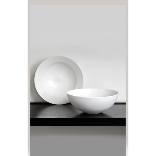 Artist Collaboration White Porcelain Wide Soup Bowls in ivory — in a room setting