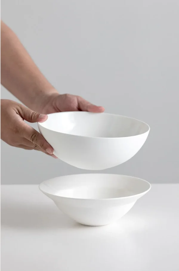 Artist Collaboration White Porcelain Wide Soup Bowls in ivory — in a room setting