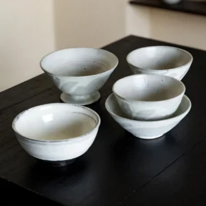 Artist Collaboration White Swirl Stoneware Conical Bowls in ivory — front view