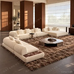Crescent Curved Modular Sofa in oatmeal — in a room setting