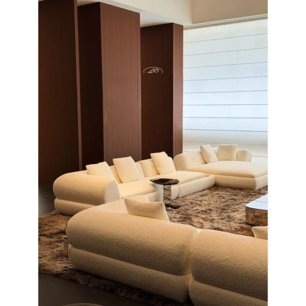 Crescent Curved Modular Sofa in oatmeal — in a room setting