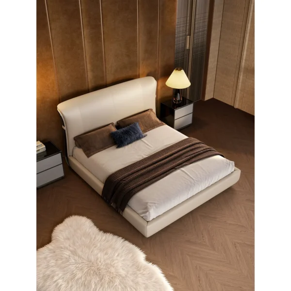 Liuying High-Gloss Ebony and Leather Bed in clay — in a room setting