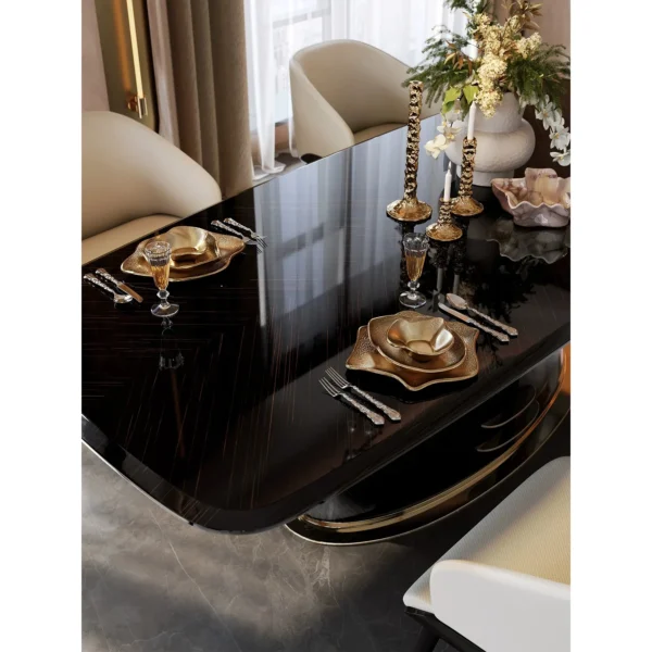Yujing High-Gloss Ebony Dining Table with Champagne Trim in clay — in a room setting