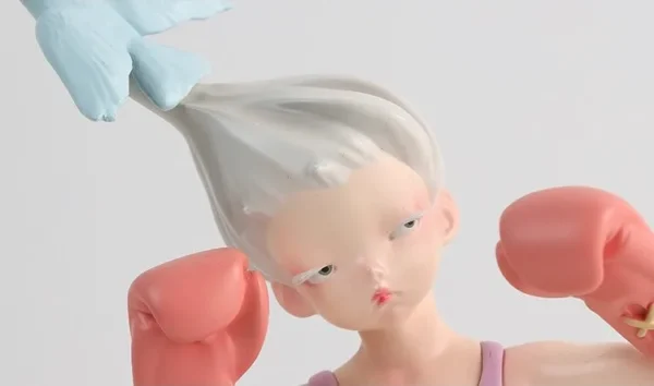 Sweet Strike Boxing Girl Artist Sculpture, Gift Boxed in rose stone — in a room setting