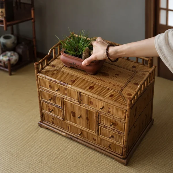 Bamboo Tabletop Multi-Drawer Curio Chest in natural oak — in a room setting
