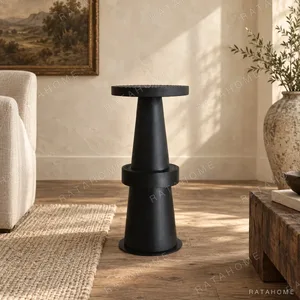 Tale Sculptural Black Wood Bar Stool in black — in a room setting