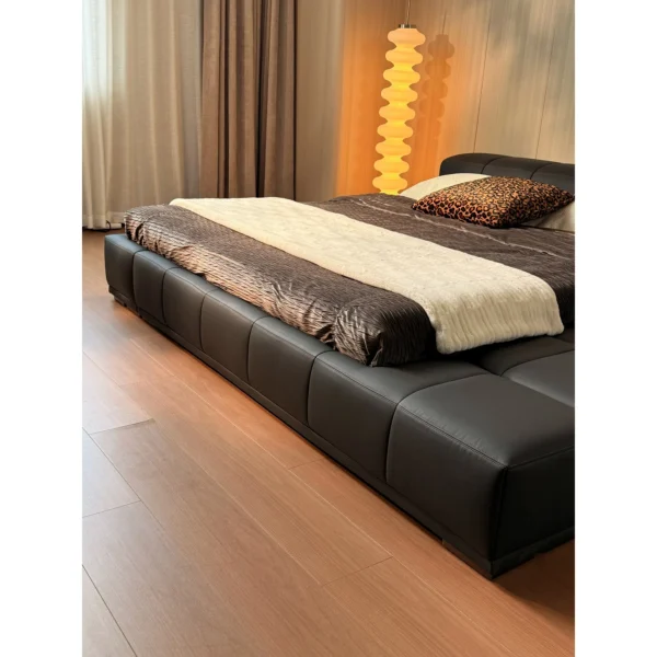 Borui Black Leather Tatami Platform Bed in black — in a room setting