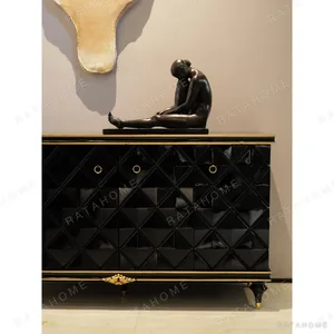 Taylor Black and Gold Diamond-Front Sideboard in black — in a room setting
