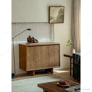Burmese Teak Sideboard with Wave-Carved Doors in clay — in a room setting