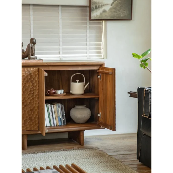 Burmese Teak Sideboard with Wave-Carved Doors in clay — in a room setting