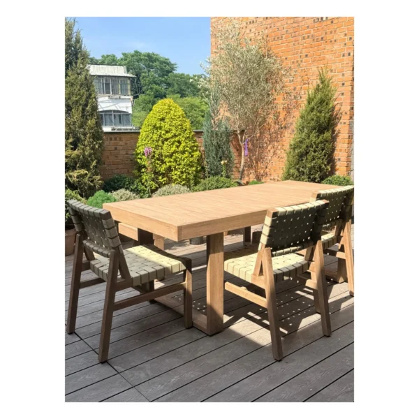 Teak Outdoor Dining Table with Bench and Webbed Chairs in natural oak — in a room setting