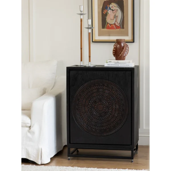 Hena Teak Small Side Cabinet with Carved Mandala Door, 60 cm in black — in a room setting