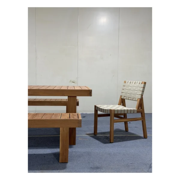 Teak Outdoor Dining Set with Webbed Chairs and Bench in natural oak — in a room setting