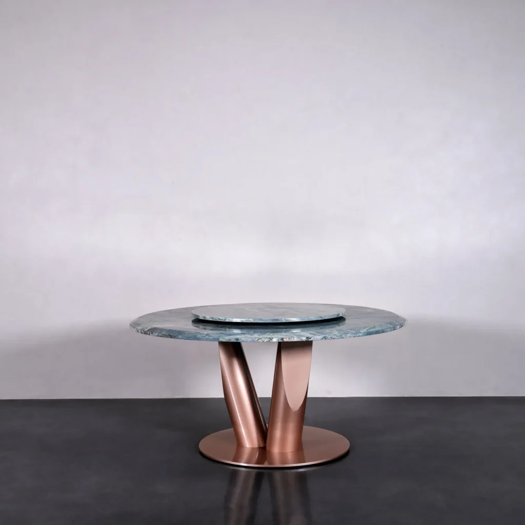 Teal Marble Round Dining Table on Rose Gold Curved Base in blue — front view