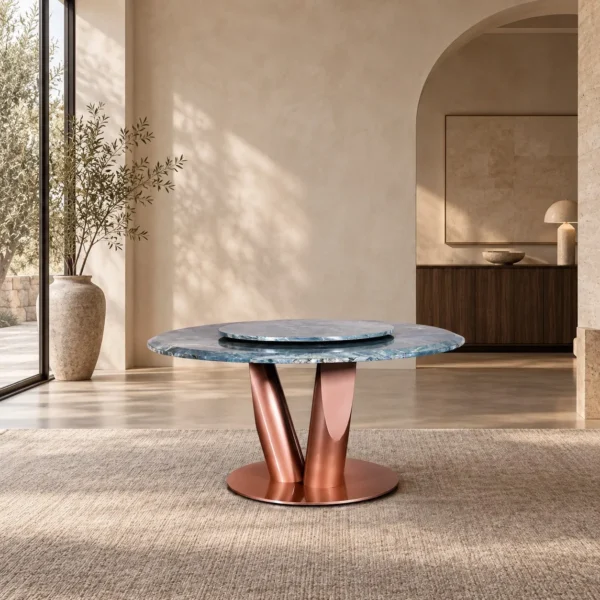 Teal Marble Round Dining Table on Rose Gold Curved Base in blue — in a room setting