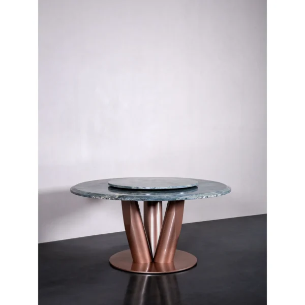 Teal Marble Round Dining Table on Rose Gold Curved Base in blue — in a room setting
