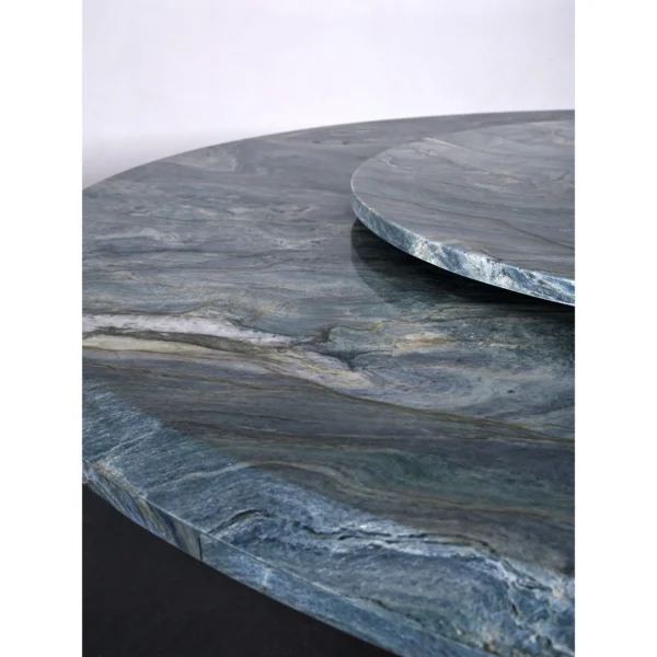 Teal Marble Round Dining Table on Rose Gold Curved Base in blue — in a room setting