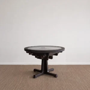 Tenon Nexus Round Glass-Top Table on Joined Wood Base in clay — front view