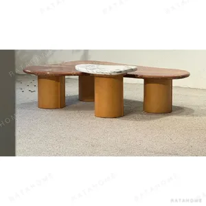 Terracotta Cloud Marble Coffee Table in rust — in a room setting