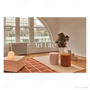 Terracotta Fine Check Rug with Cream Block in rust — in a room setting