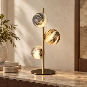 Three Marbled Glass Globe Table Lamp on Brass Stem in brushed brass — front view