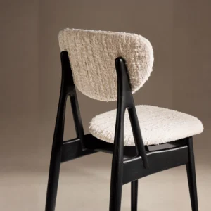Leila Black Ash Dining Chair with Bouclé Cushions in black — front view
