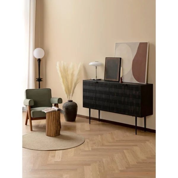 Dark Cloud Perforated Cabinet on Tall Black Legs in black — in a room setting