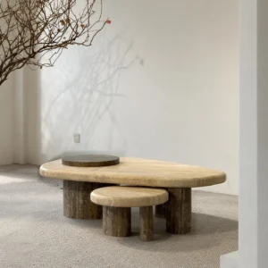 Travertine Nesting Coffee Table Pair on Cylinder Legs in sand — front view
