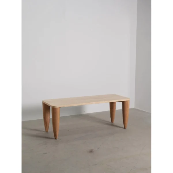 Travertine-Top Elephant-Leg Table in Ash — in a room setting