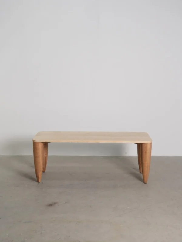 Travertine-Top Elephant-Leg Table in Ash — in a room setting