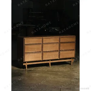 Nine-Drawer Solid Wood Sideboard on Open Frame Base in natural oak — in a room setting