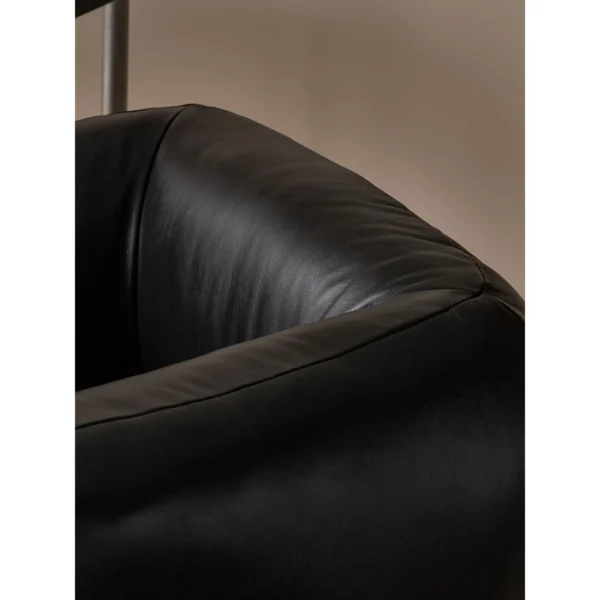 Tulip Black Leather Armchair with Goose Down Cushions in black — in a room setting