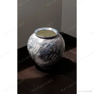 Twisted Glaze Blurred Ceramic Jar Vase in Grey and Blue — in a room setting