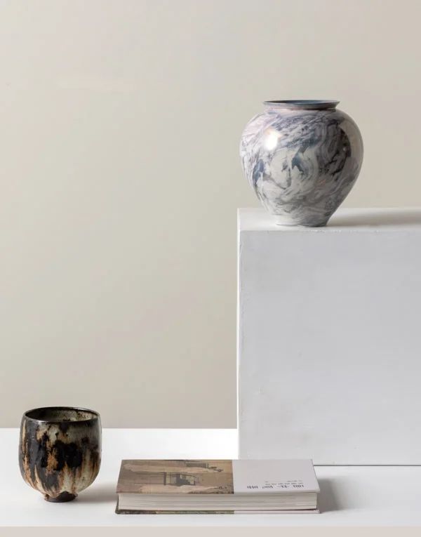 Twisted Glaze Blurred Ceramic Jar Vase in Grey and Blue — in a room setting