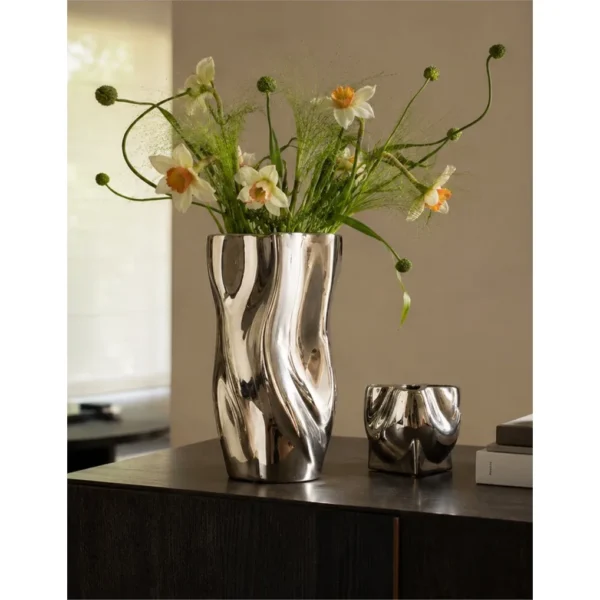 Twisted Pleated Silver-Plated Ceramic Vases, Wave and Pocket in silver — in a room setting