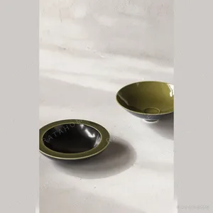 Two-Tone Glazed Conical Salad Bowl, Indigo or Olive in blue — in a room setting