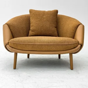 Caramel Two-Tone Leather and Fabric Curved Lounge Chair — front view