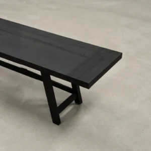 Ubud Black Wood Bench with Crossed Legs in black — front view