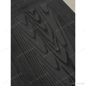 Ubud Black Wood Bench with Crossed Legs in black — in a room setting