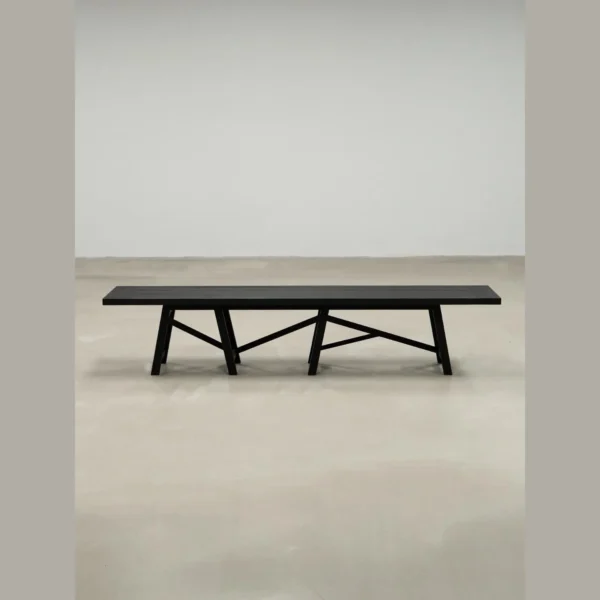Ubud Black Solid Wood Long Bench in black — in a room setting
