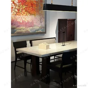 Uccle Marble Dining Table on Architectural Base in oatmeal — in a room setting
