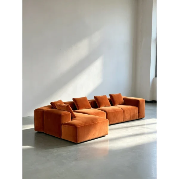 Understated Statement Sectional in Caramel Orange Velvet — in a room setting