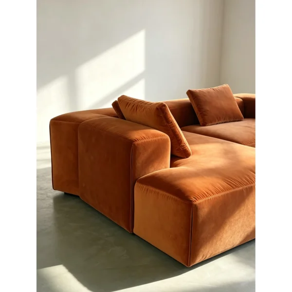 Understated Statement Sectional in Caramel Orange Velvet — in a room setting